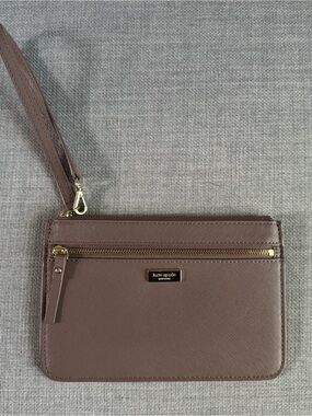 kate spade taupe leather wristlet with gold-tone hardware